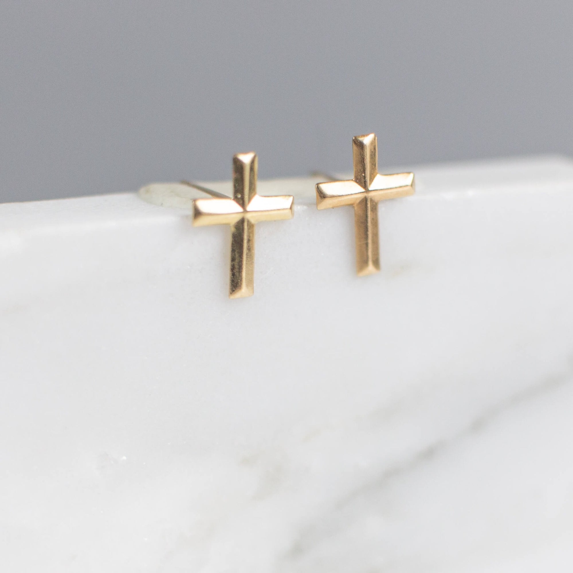 solid gold cross earrings by good wknd