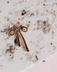 Elongated Gold Bow Charm