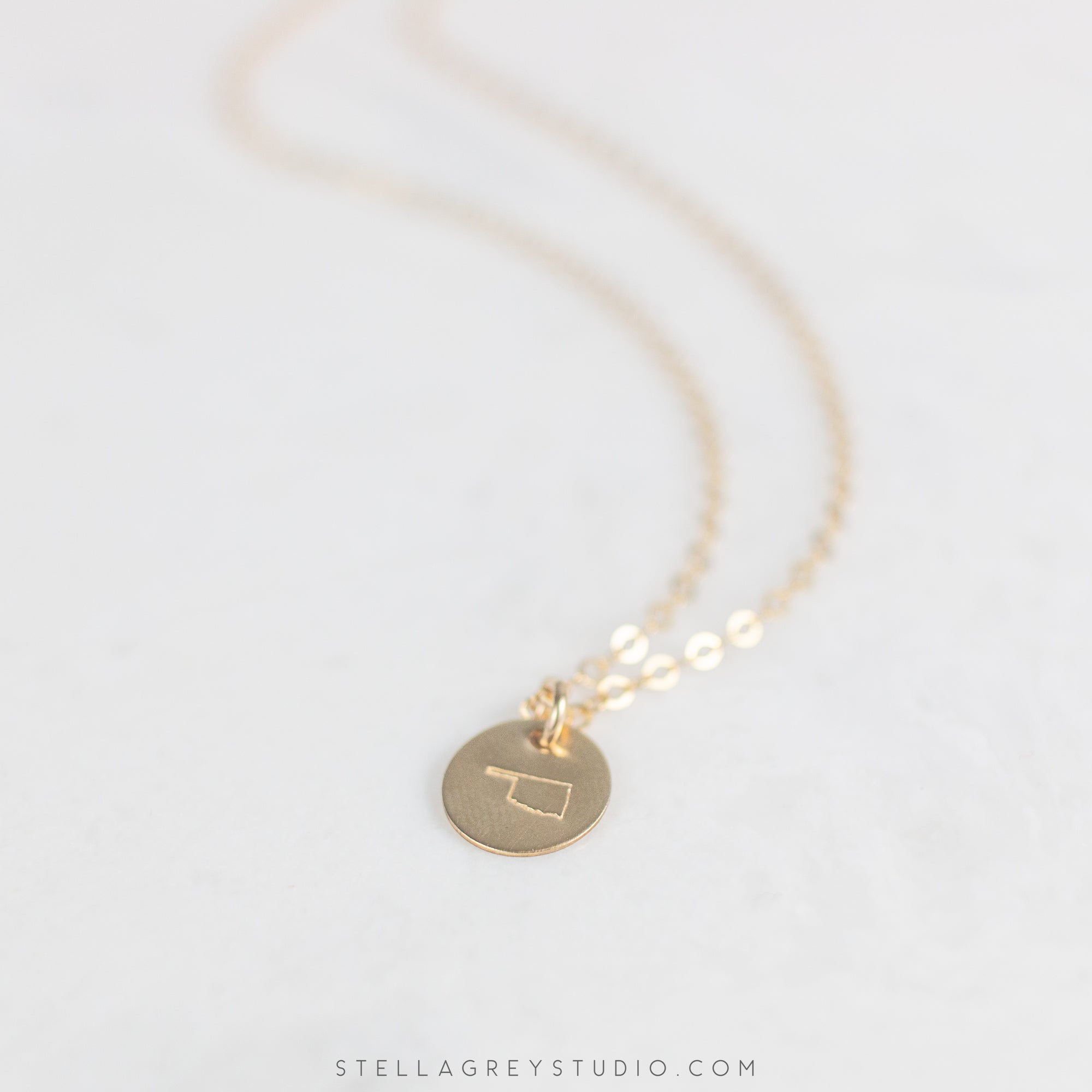 dainty oklahoma disc necklace