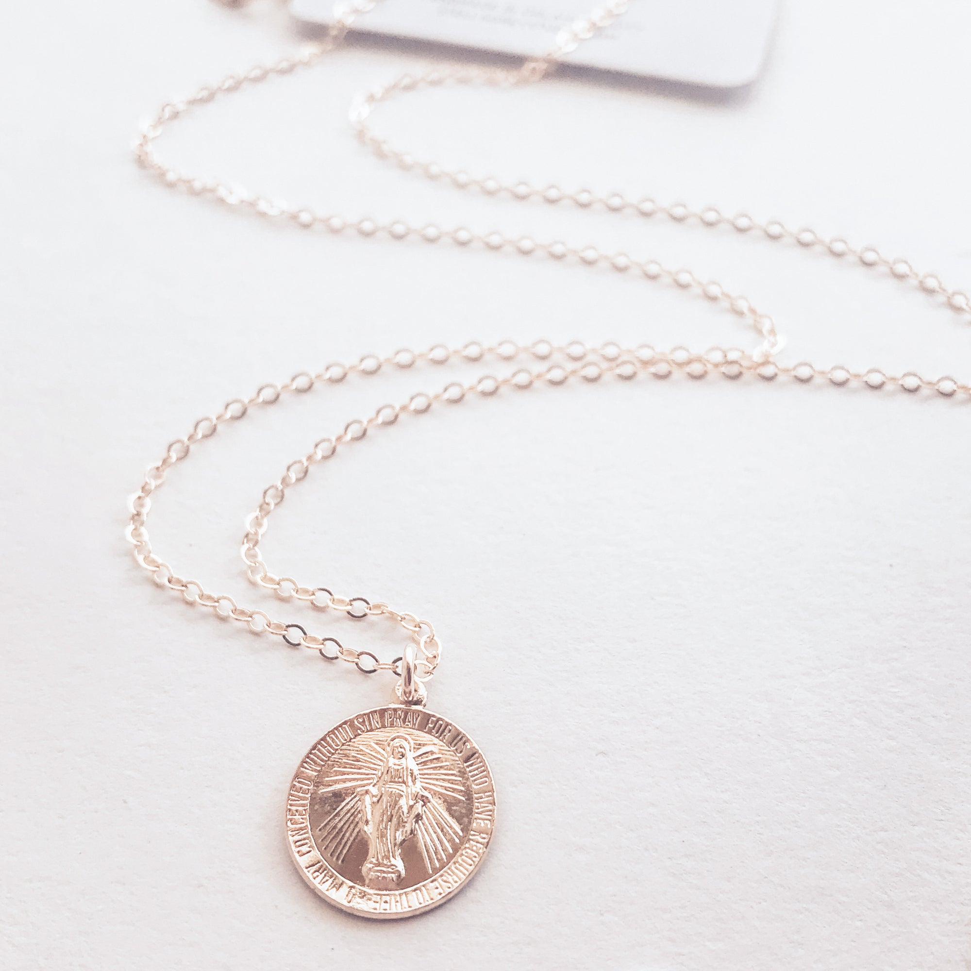 gold mary necklace