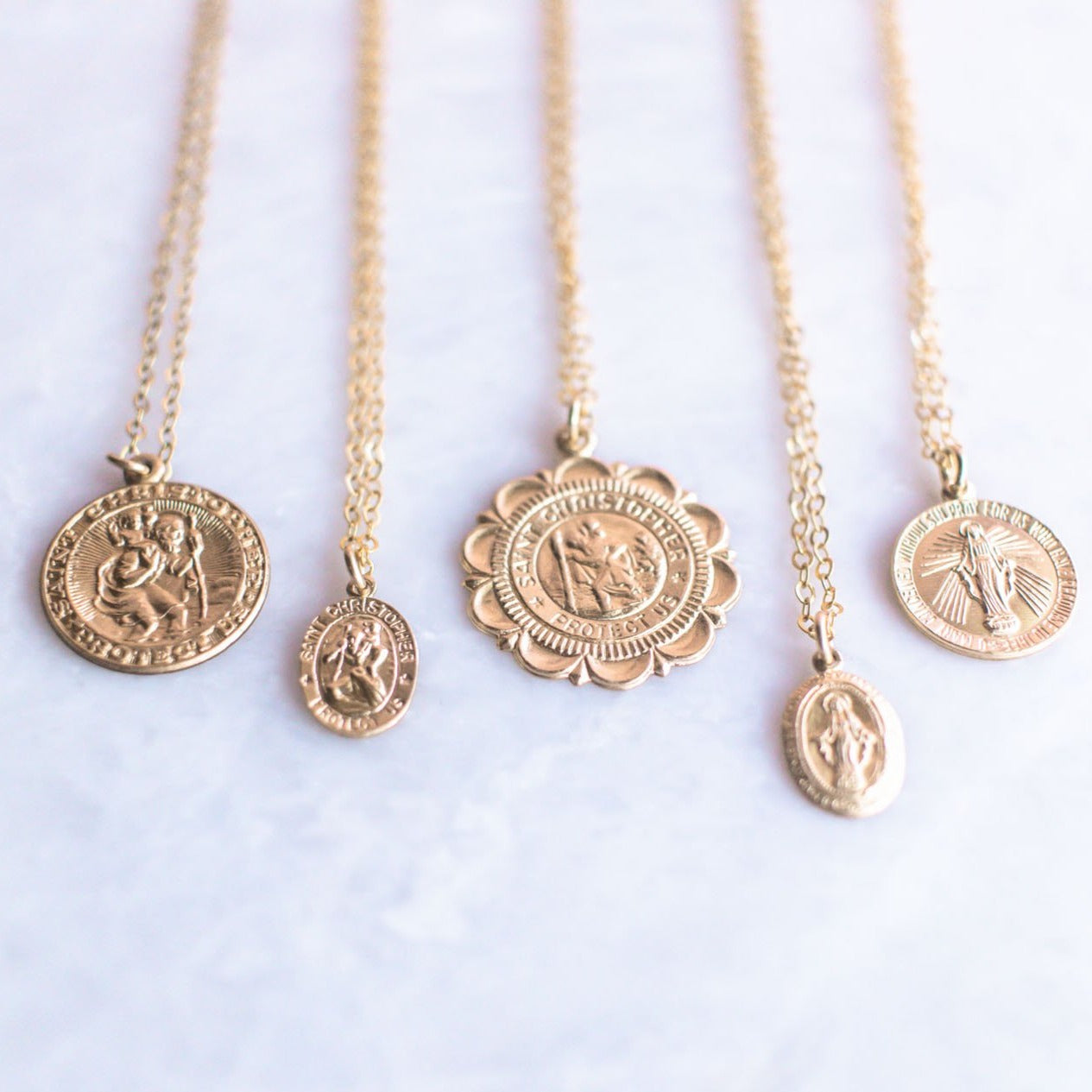 saint gold coin necklace