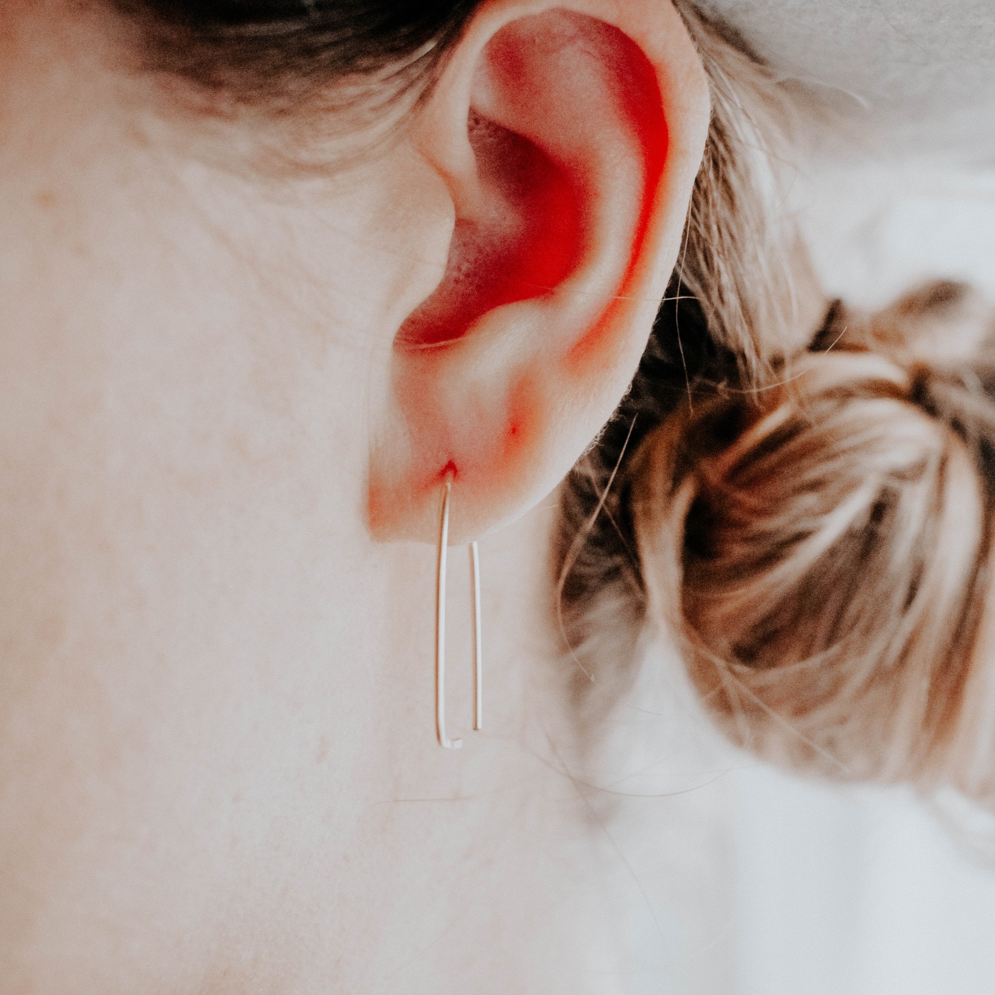 gold statement earrings Stella grey