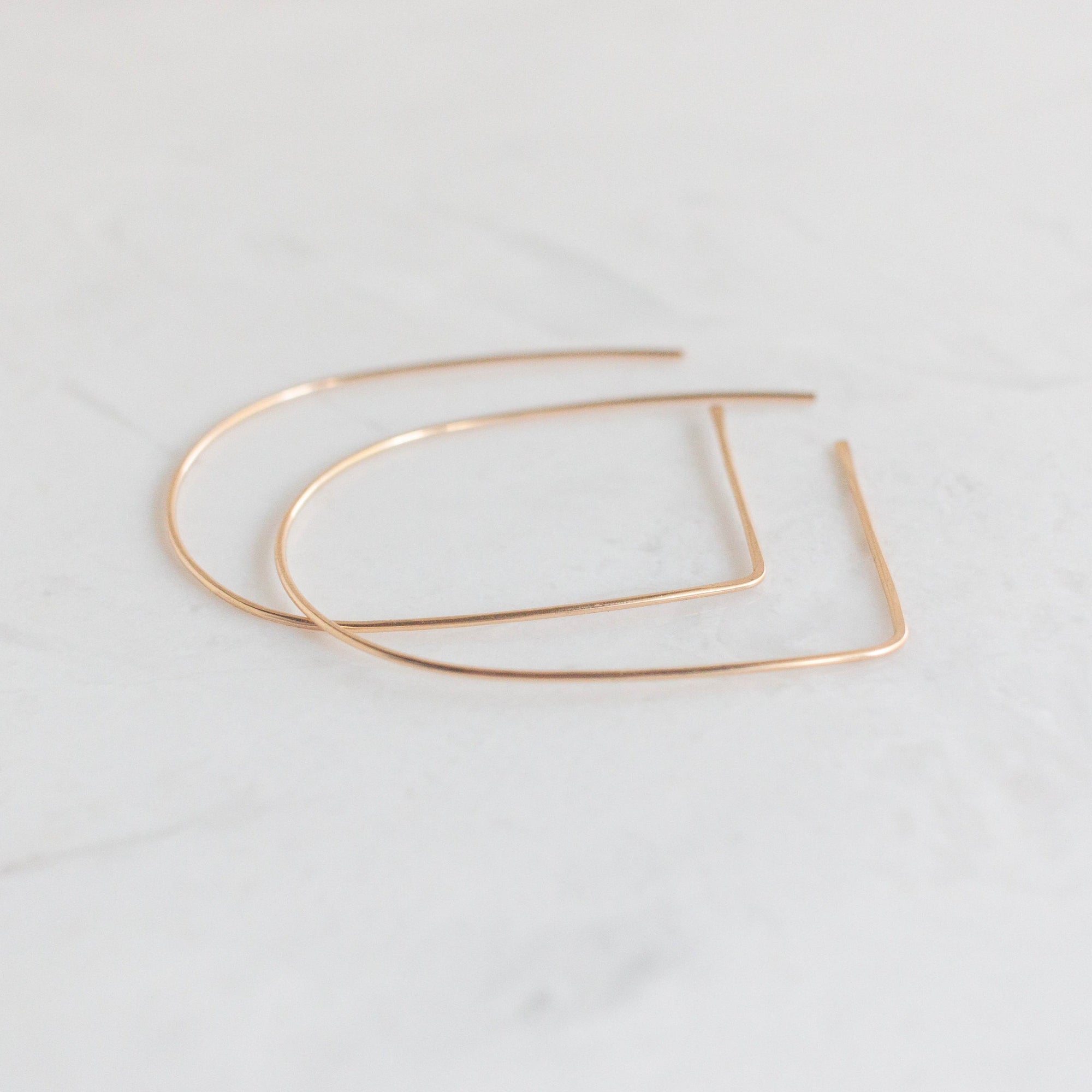 large gold archeway earrings