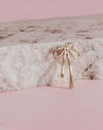 Elongated Gold Bow Charm