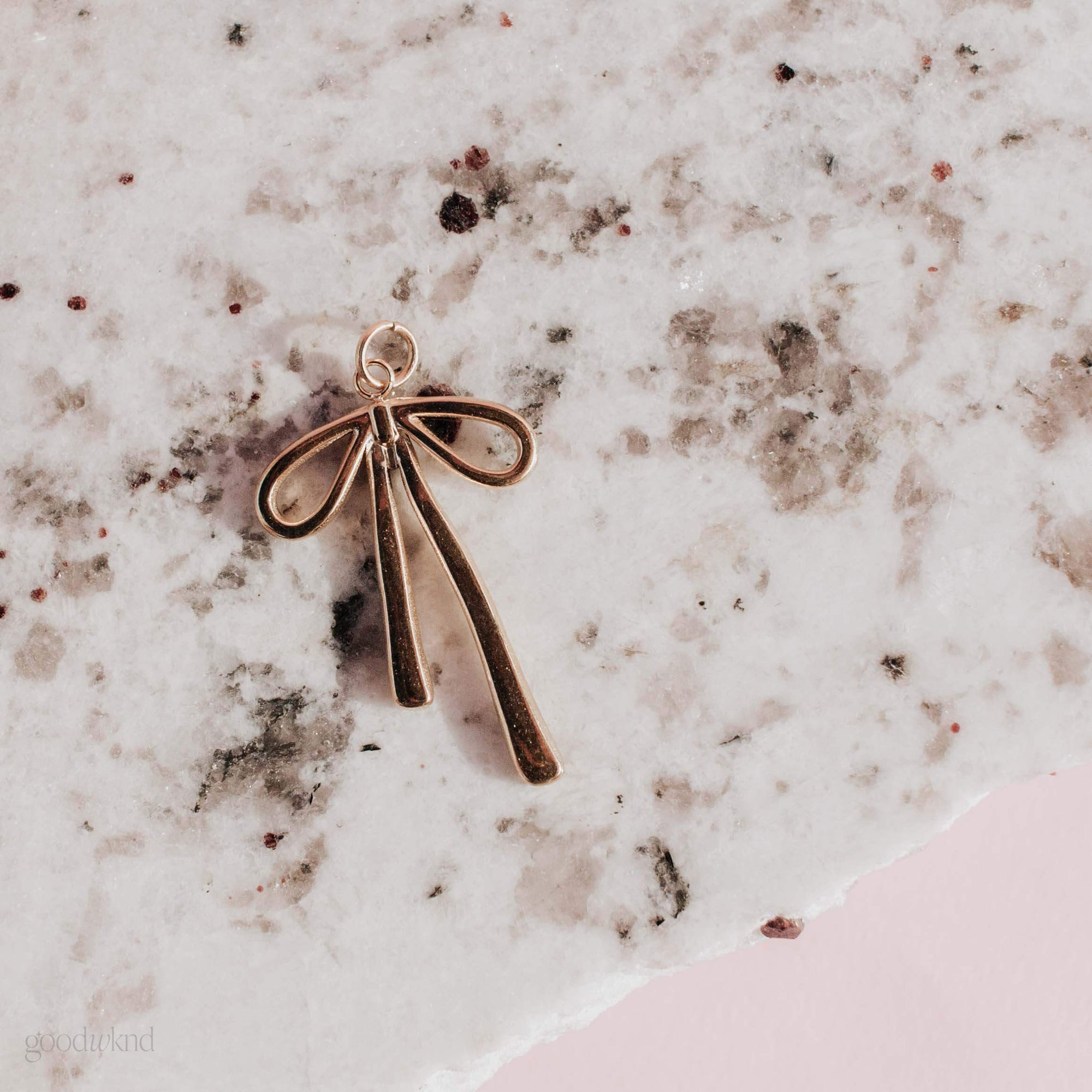 Elongated Gold Bow Charm