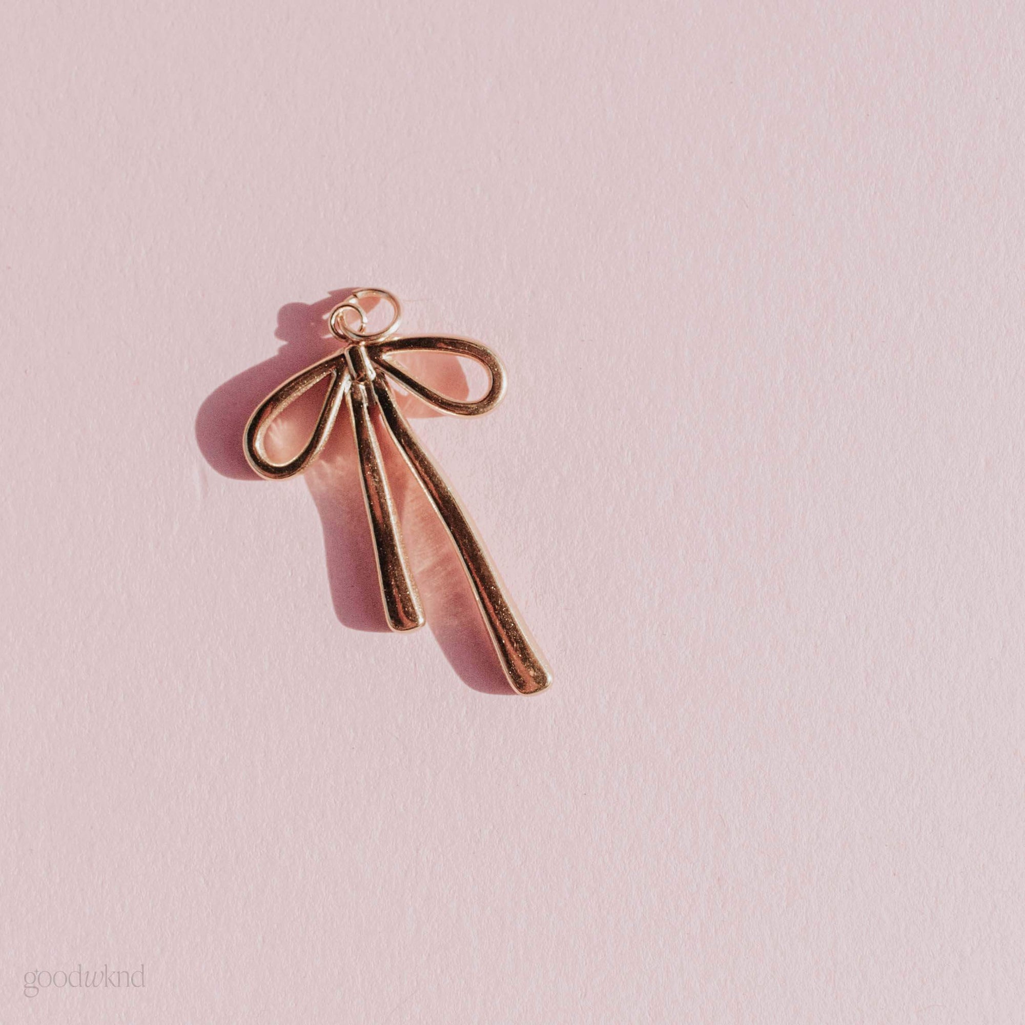 Elongated Gold Bow Charm