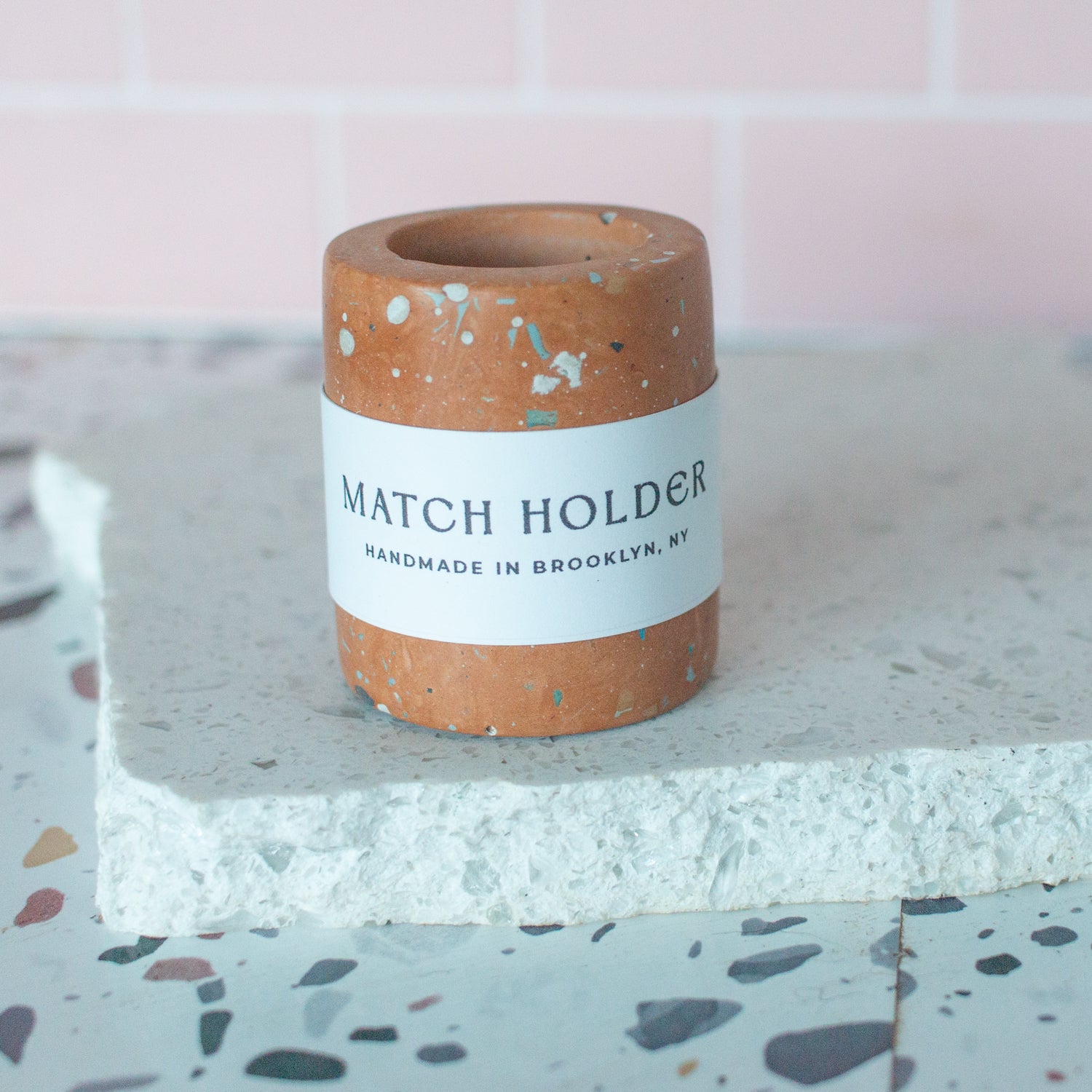 concrete match holder